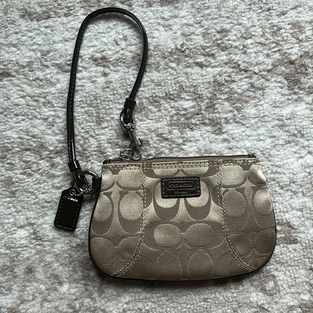 Never been used Coach wristlet!
